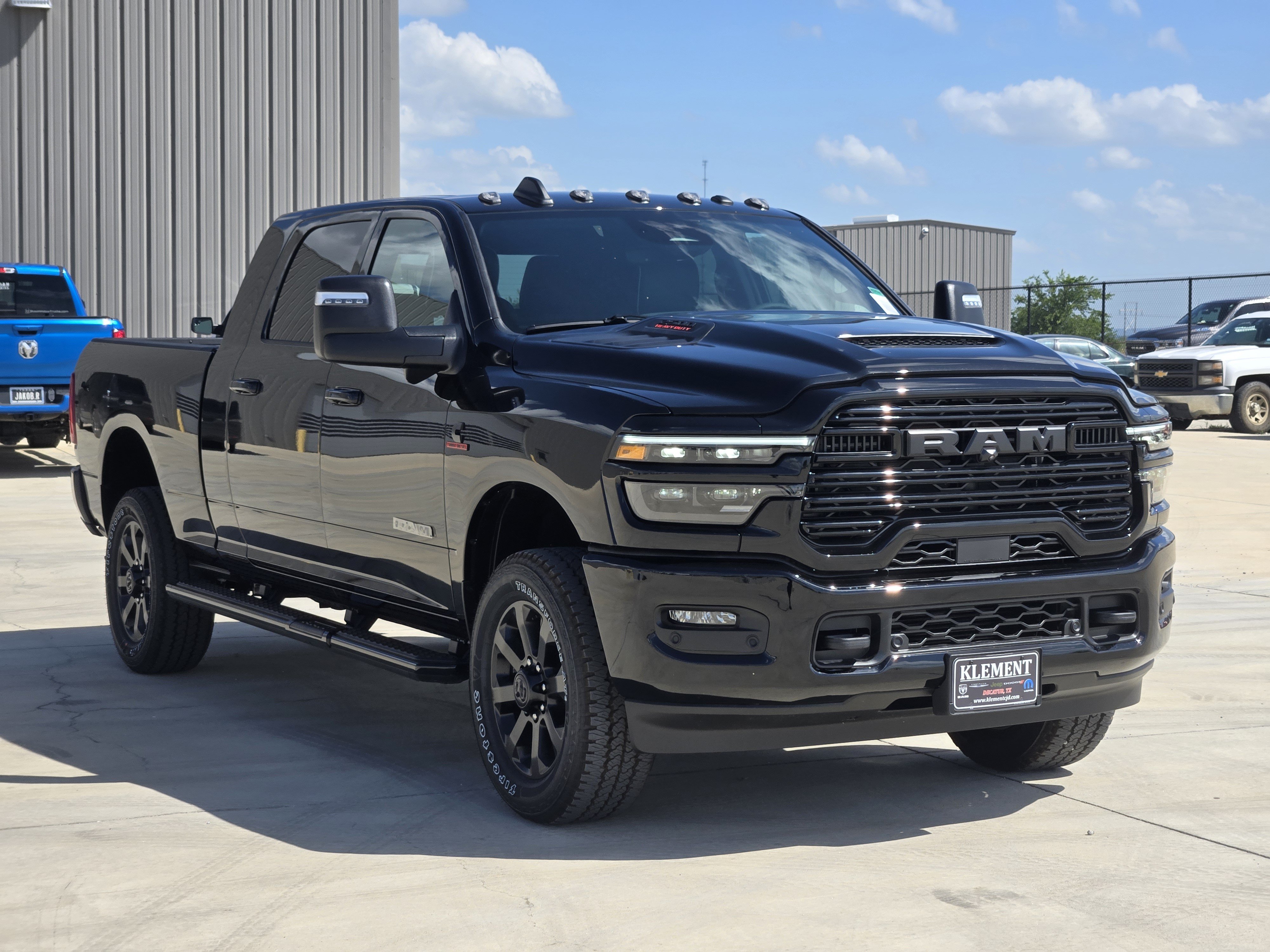 New 2026 Diamond Black Crystal Pearl-Coat Exterior Paint RAM Laramie Mega Cab 4x4 6