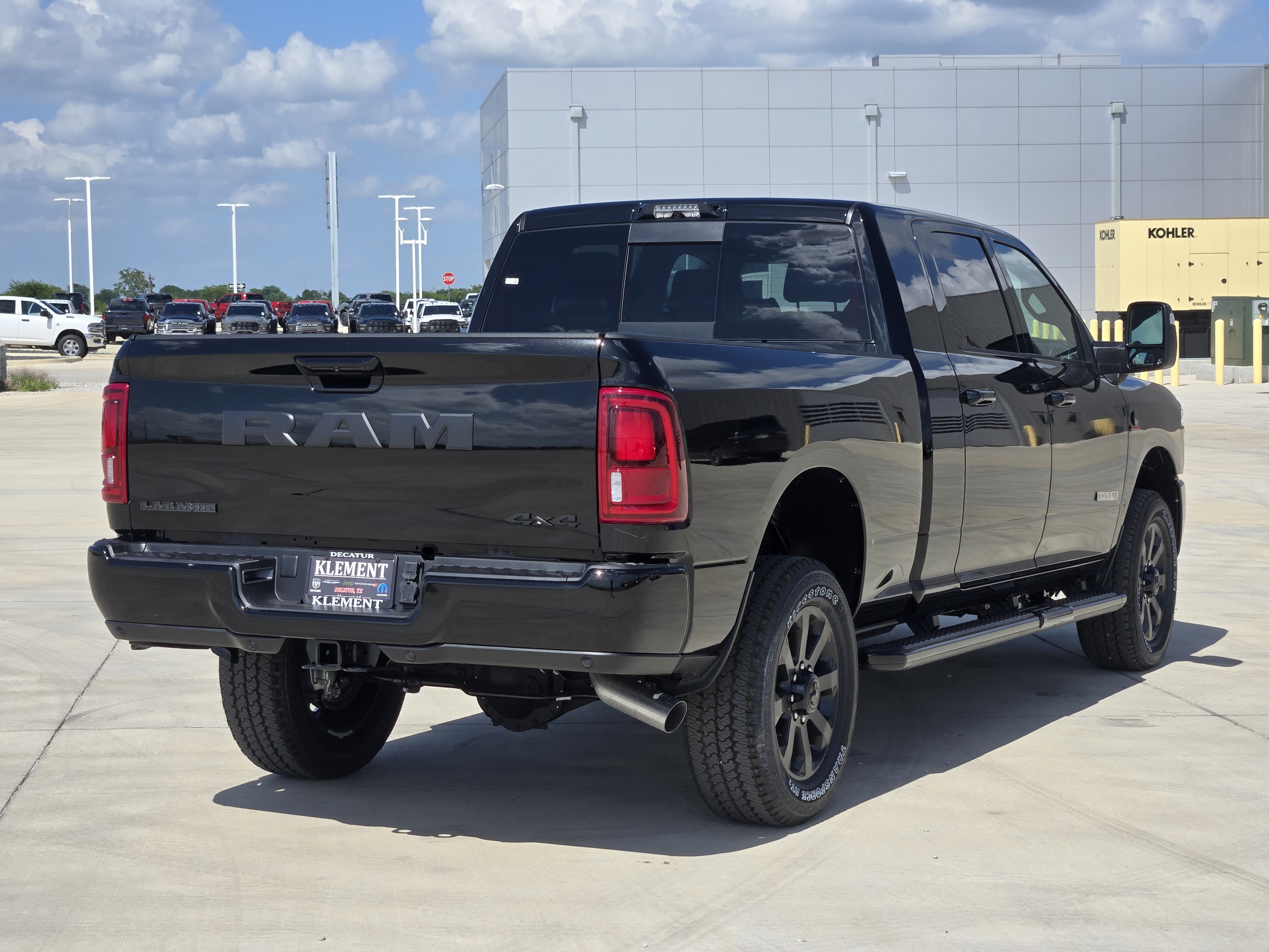 New 2026 Diamond Black Crystal Pearl-Coat Exterior Paint RAM Laramie Mega Cab 4x4 6