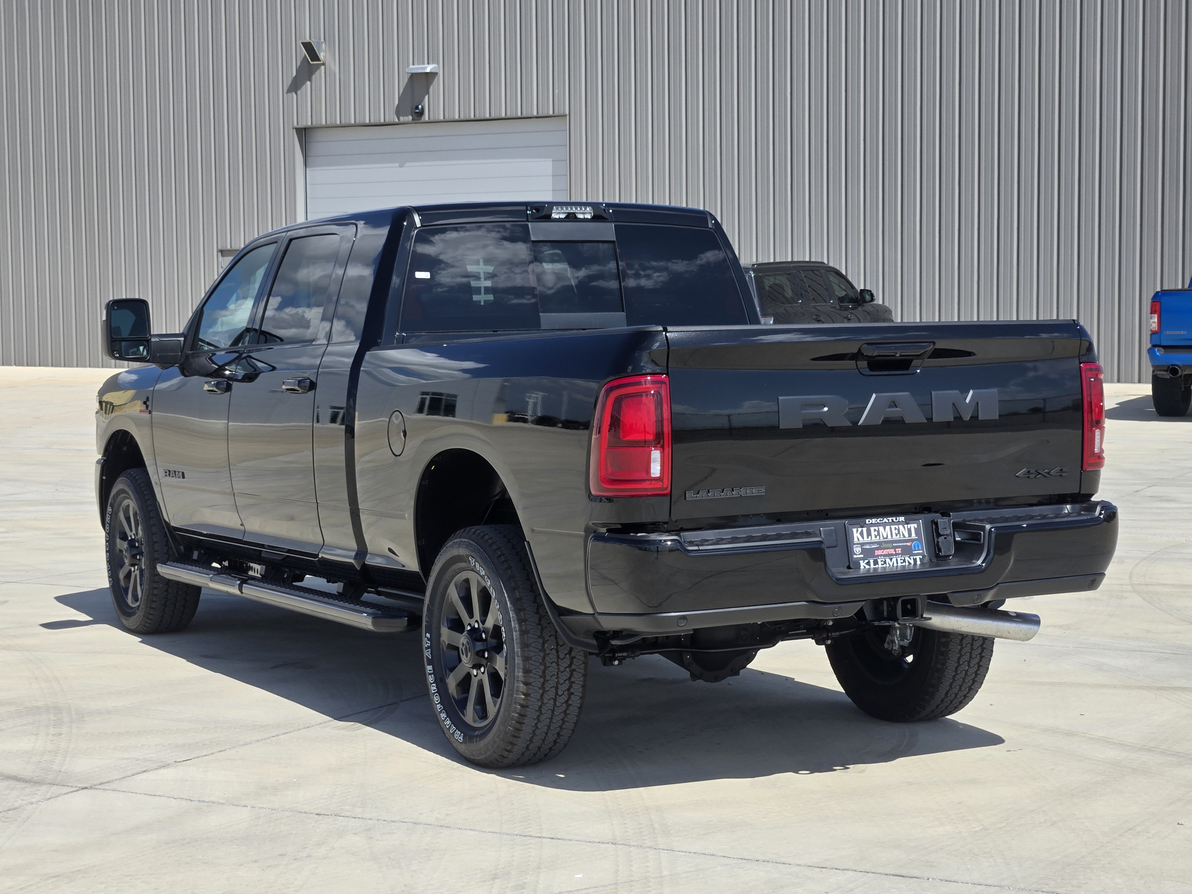New 2026 Diamond Black Crystal Pearl-Coat Exterior Paint RAM Laramie Mega Cab 4x4 6