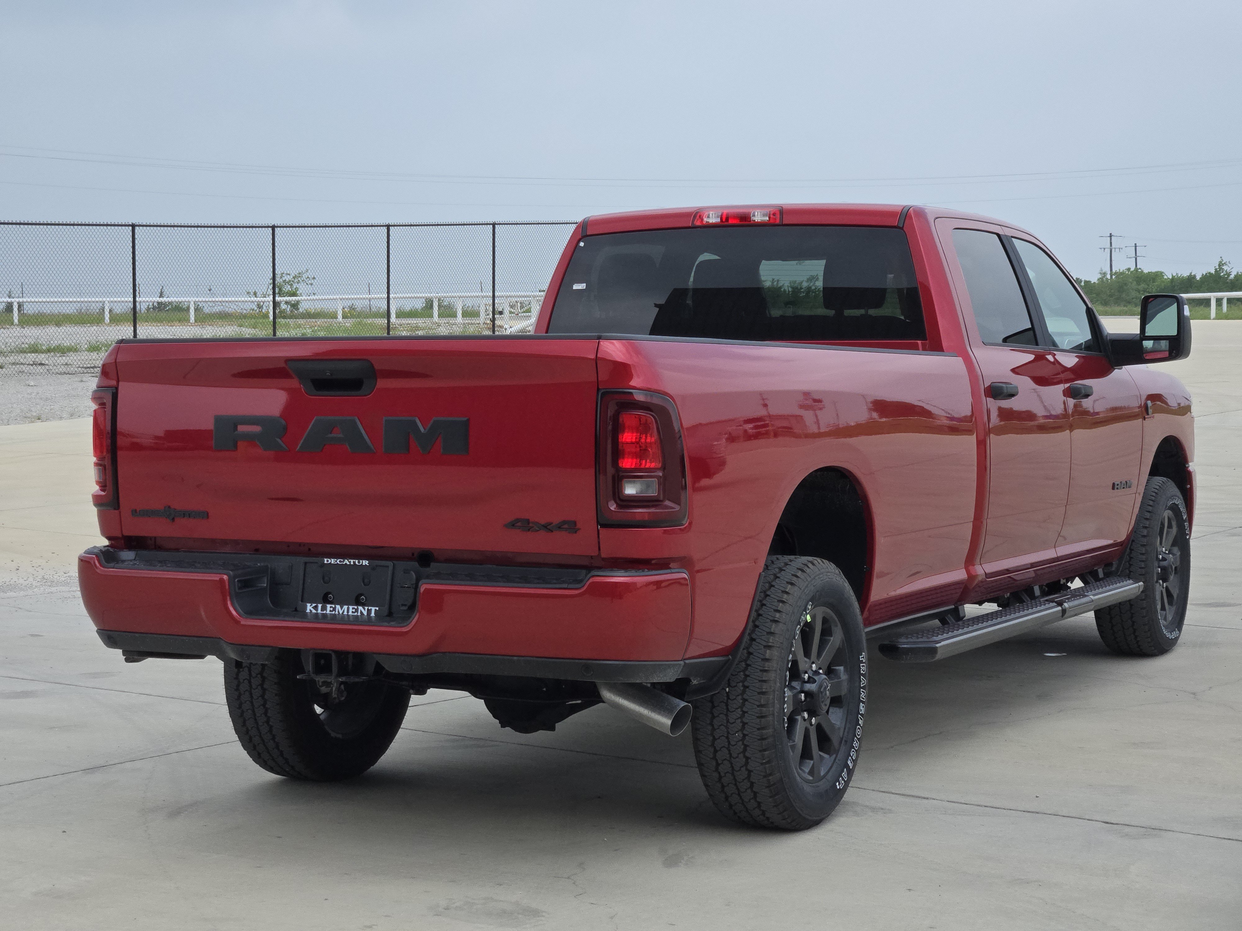 New 2026 Molten Red Pearl-Coat Exterior Paint RAM Lone Star Crew Cab 4x4 8