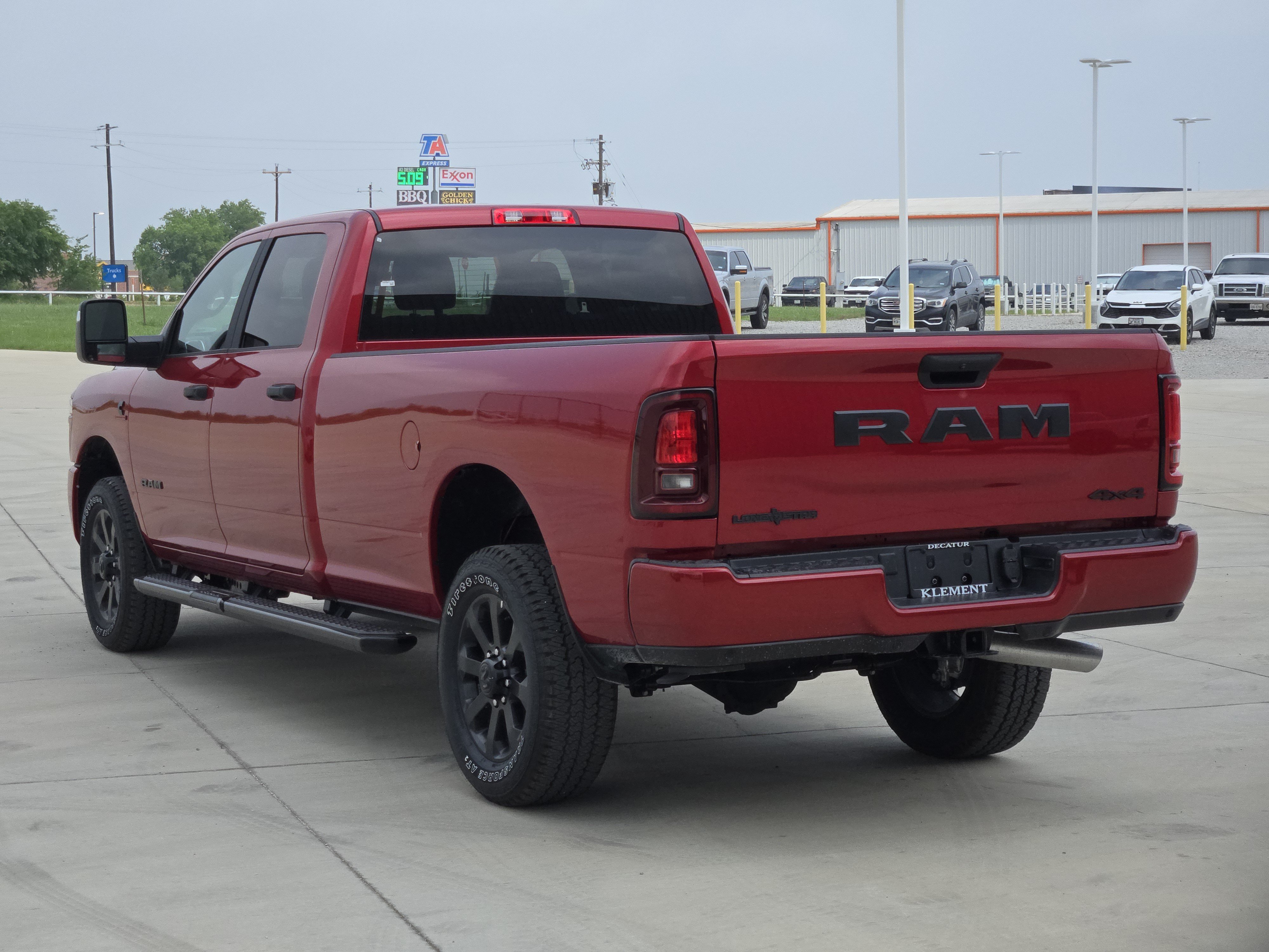 New 2026 Molten Red Pearl-Coat Exterior Paint RAM Lone Star Crew Cab 4x4 8