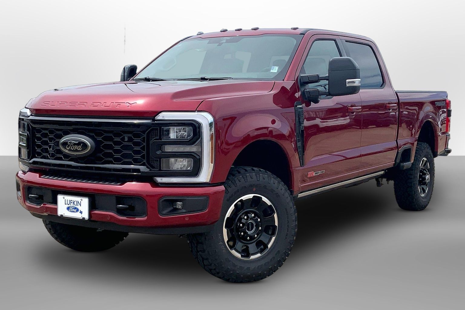 2026 Ford Super Duty F-250 SRW LARIAT Ruby Red Metallic Tinted Clearcoat at Lufkin Ford