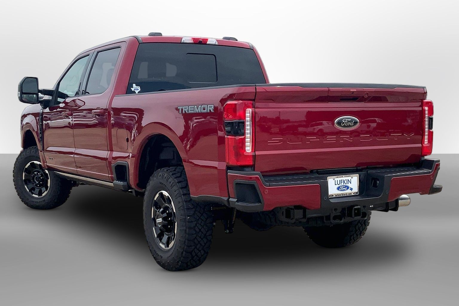 2026 Ford Super Duty F-250 SRW LARIAT Ruby Red Metallic Tinted Clearcoat at Lufkin Ford