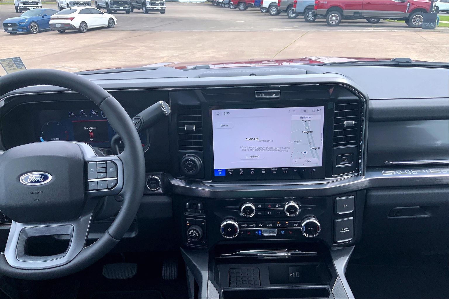 2026 Ford Super Duty F-250 SRW LARIAT Ruby Red Metallic Tinted Clearcoat at Lufkin Ford
