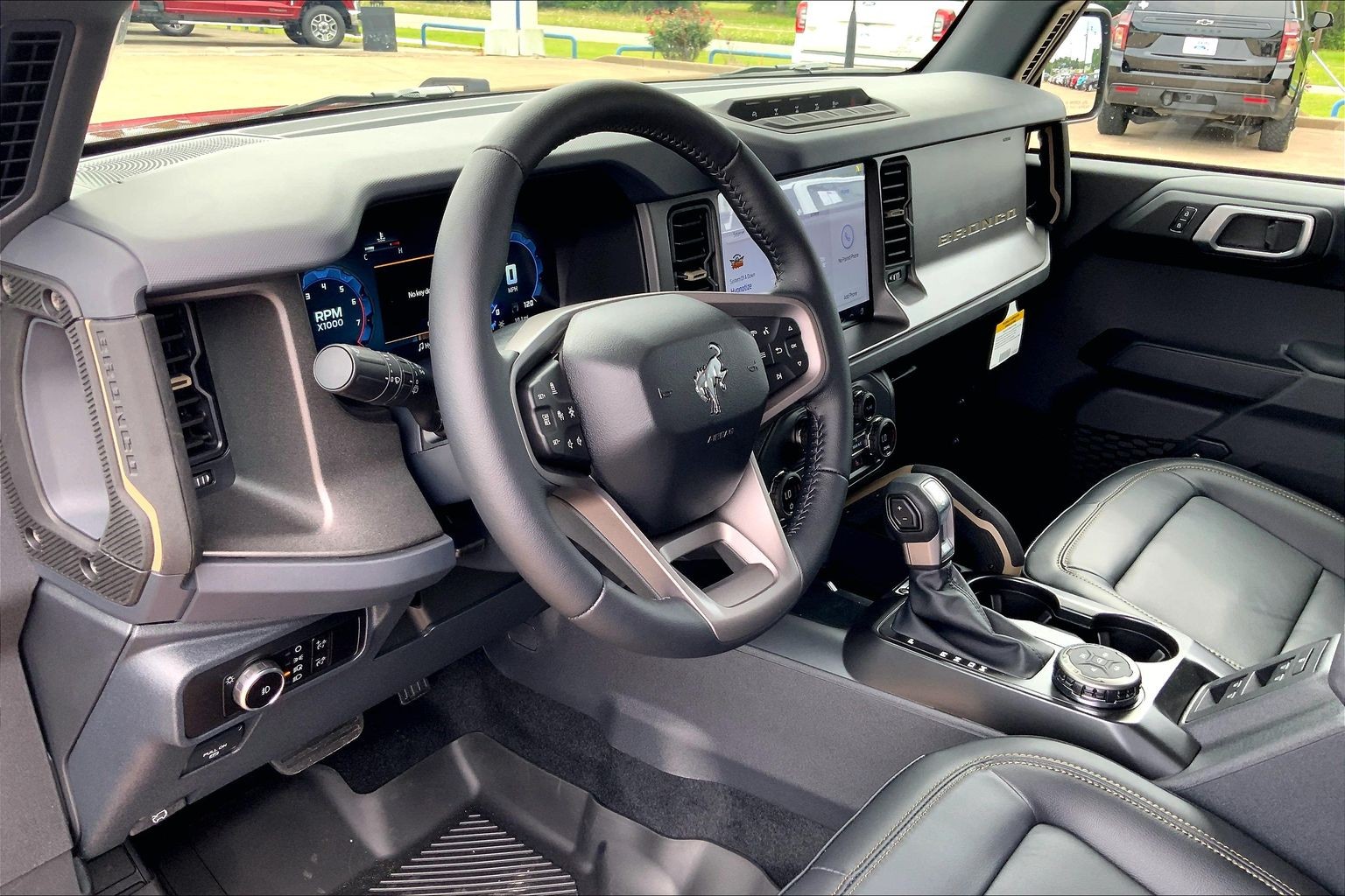 2026 Ford Bronco Badlands Ruby Red Metallic Tinted Clearcoat at Lufkin Ford