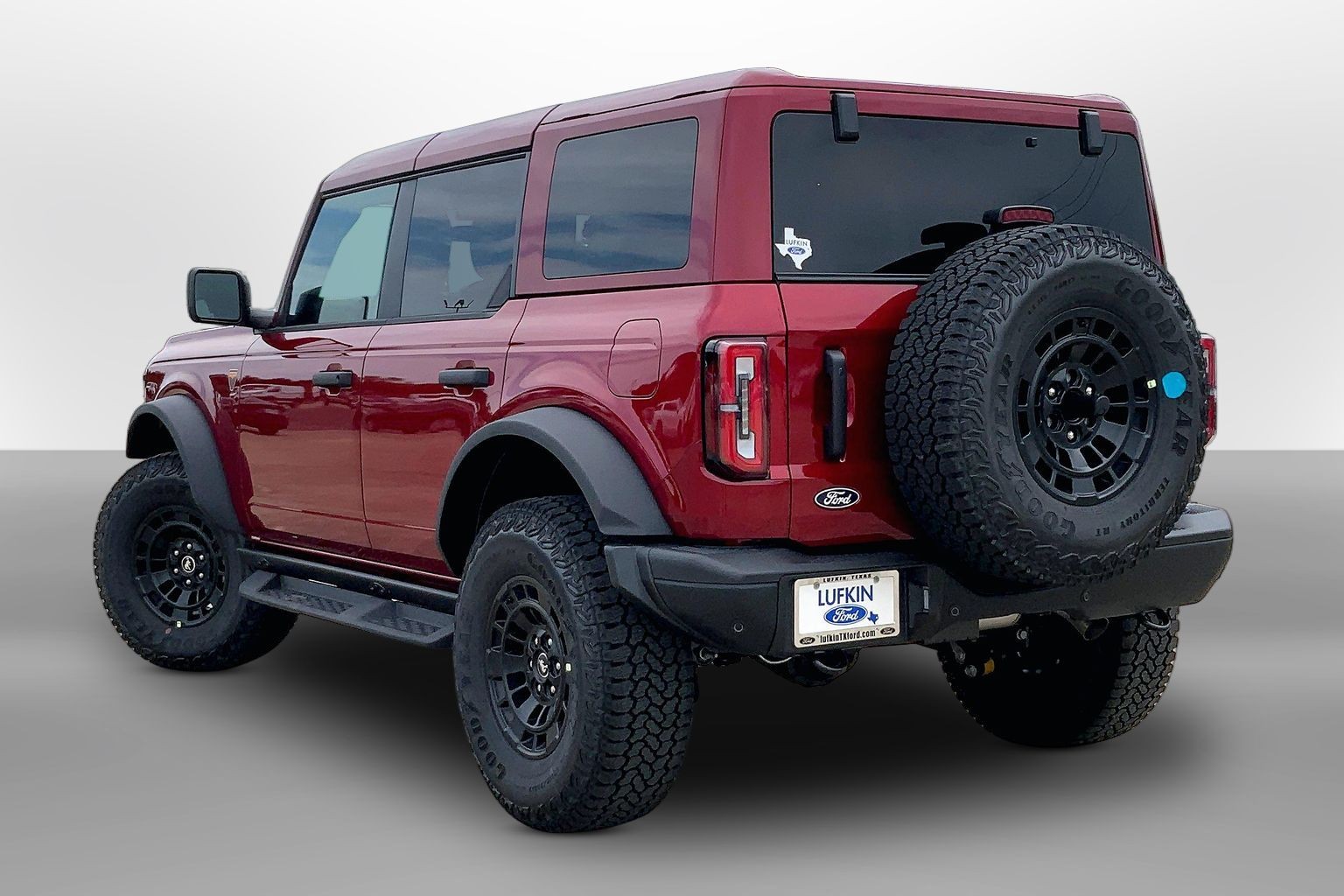 2026 Ford Bronco Badlands Ruby Red Metallic Tinted Clearcoat at Lufkin Ford