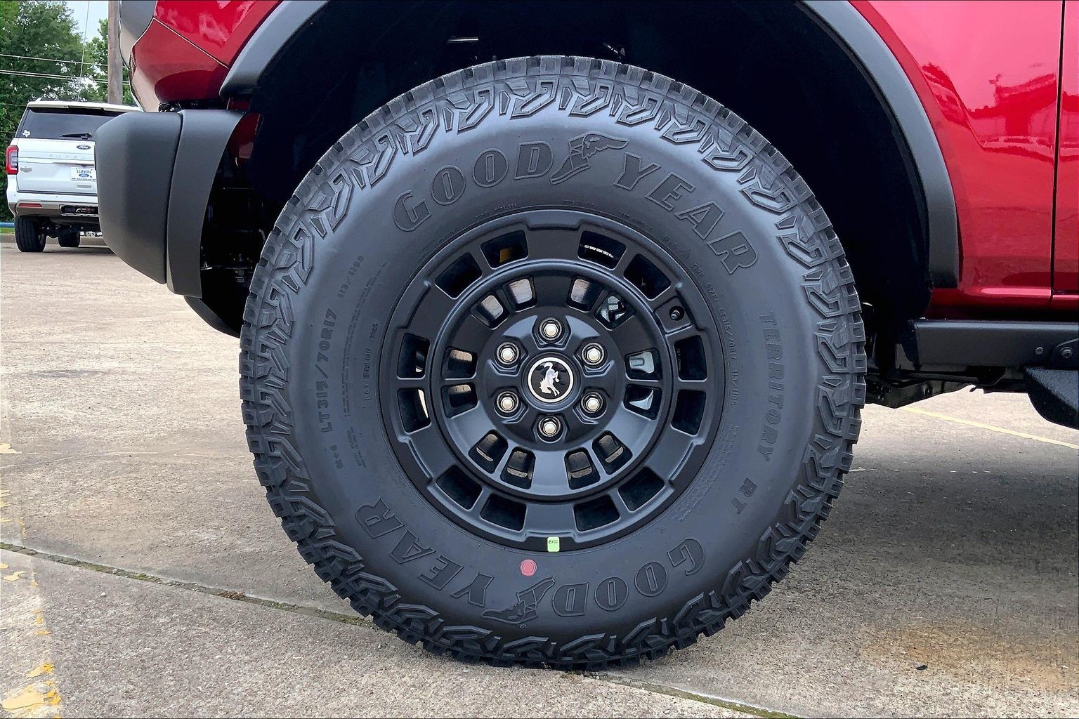 2026 Ford Bronco Badlands Ruby Red Metallic Tinted Clearcoat at Lufkin Ford