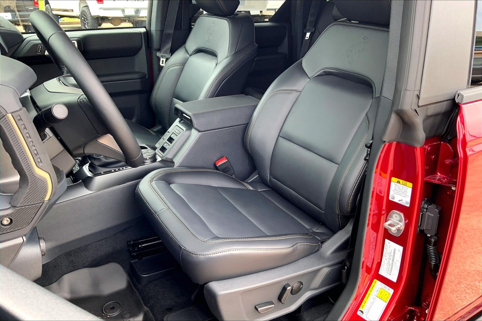 2026 Ford Bronco Badlands Ruby Red Metallic Tinted Clearcoat at Lufkin Ford