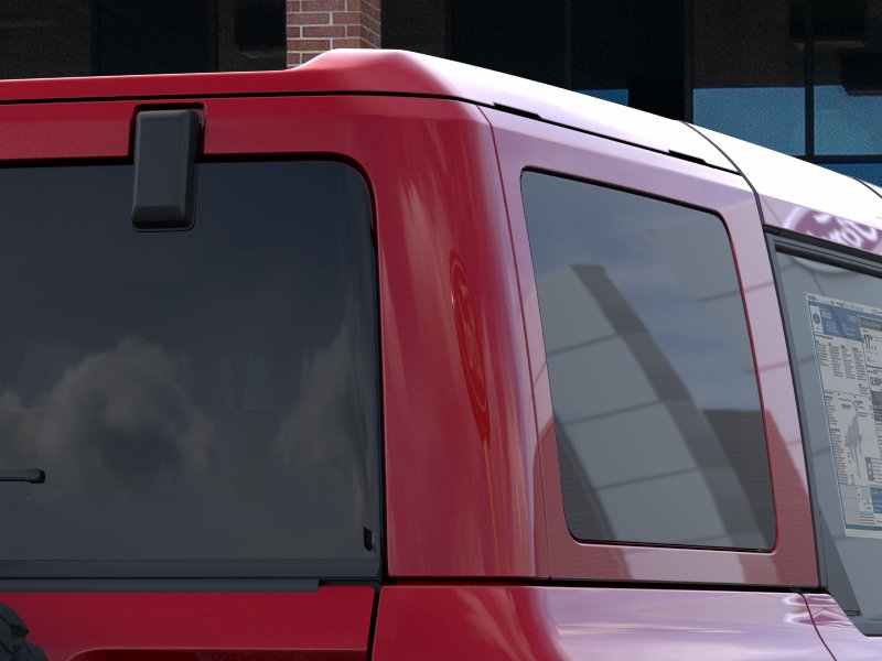 2026 Ford Bronco Badlands Ruby Red Metallic Tinted Clearcoat at Lufkin Ford