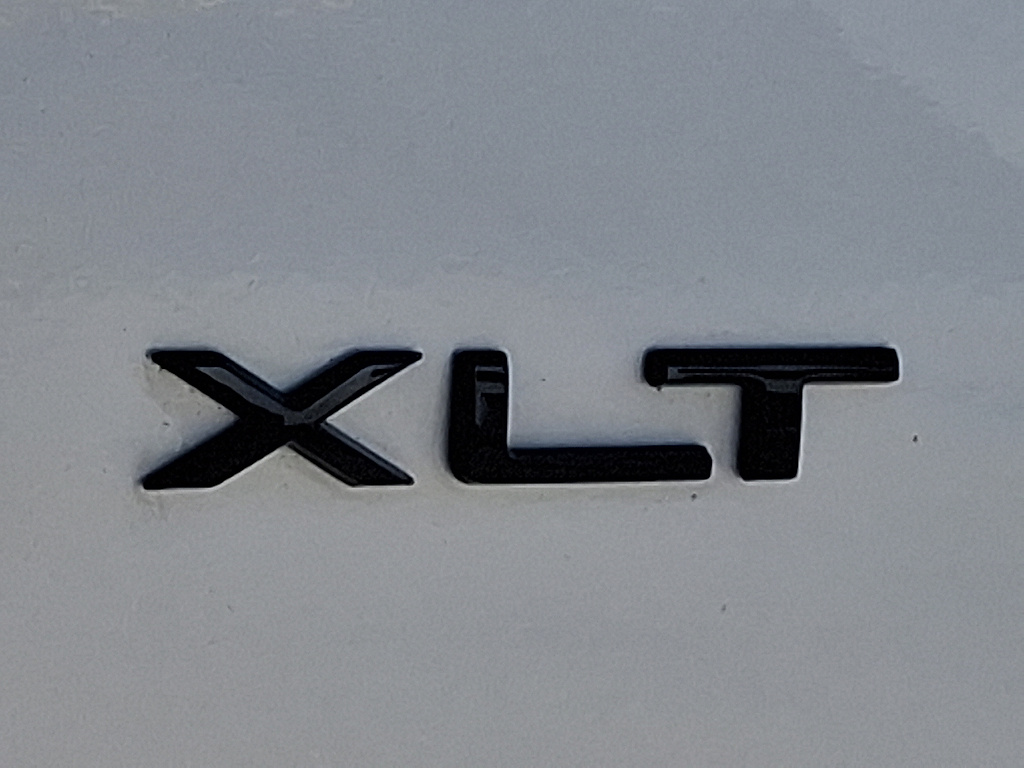 2026 Ford Transit Passenger Wagon 350 XLT Ingot Silver at Woltz & Wind Ford