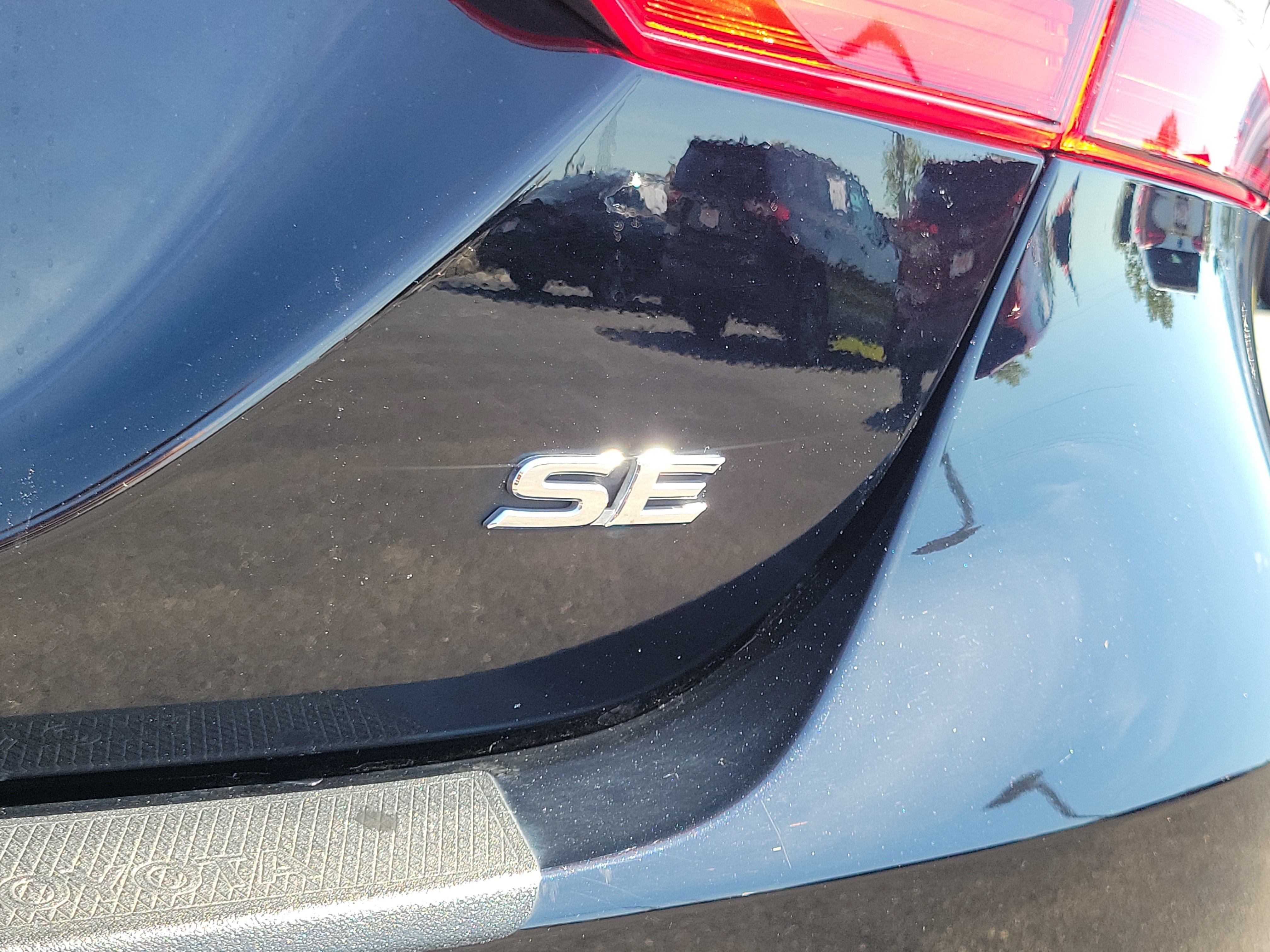 Used 2023 Midnight Black Metallic Toyota SE image 11