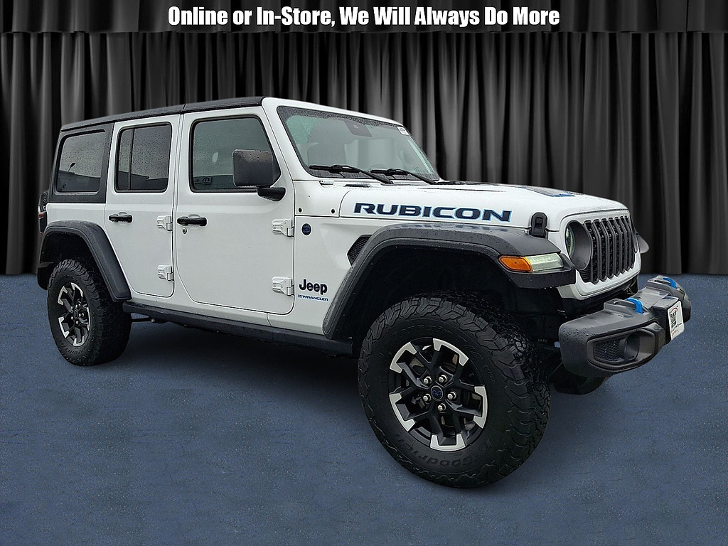 2024 Jeep Wrangler 4xe Rubicon 4xe comparison vehicle