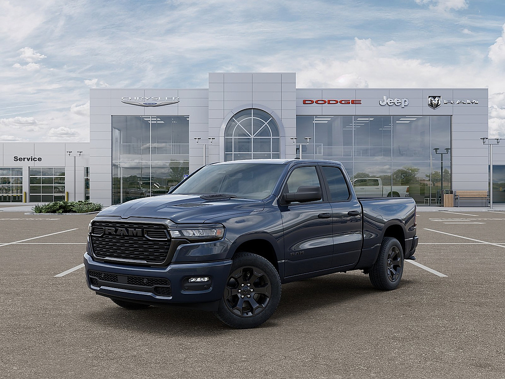 2026 Ram 1500 Express Quad Cab 4×4 6’4″ Box comparison vehicle